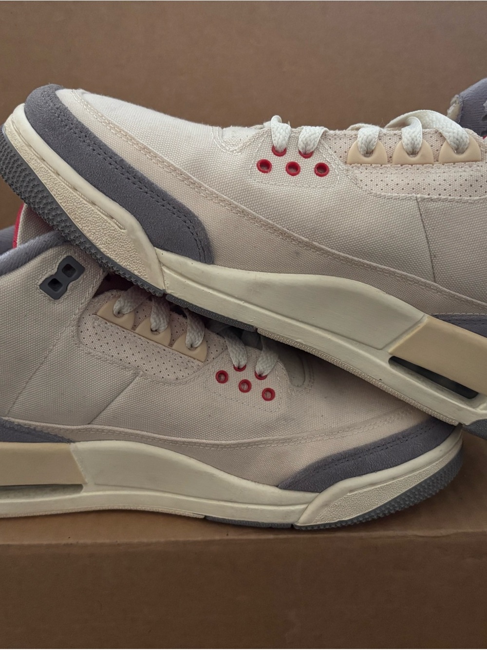 Jordan Low-Top Sneakers in Cream, Gray & Red Eyelets
